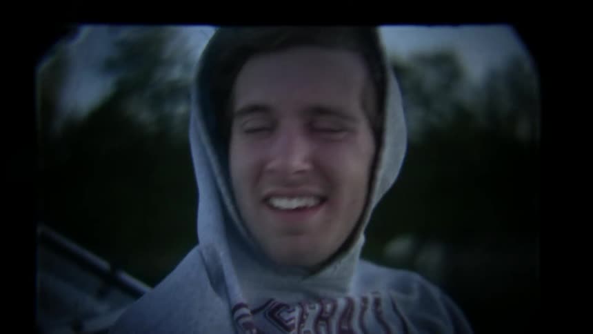 A man's hood is blown off