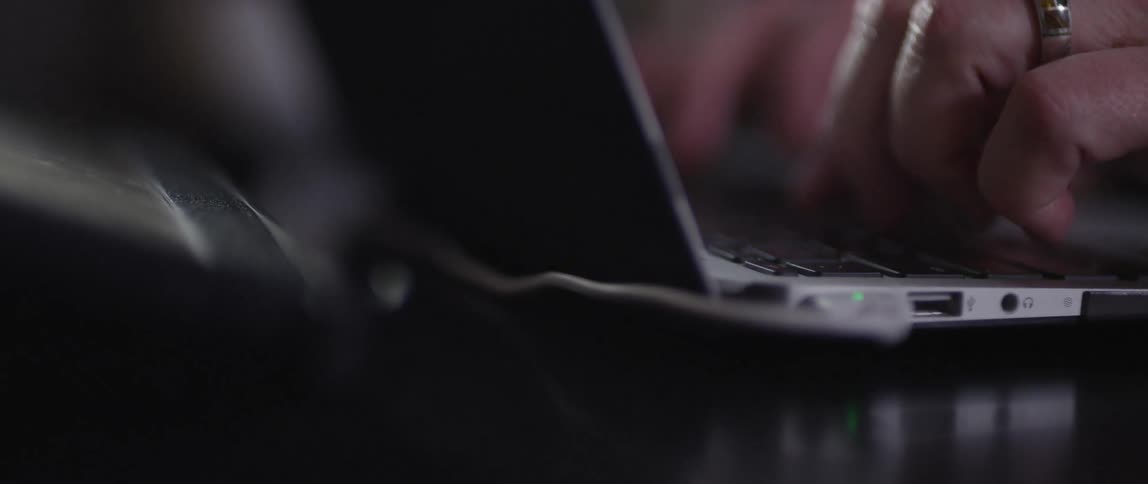 Person typing on a laptop