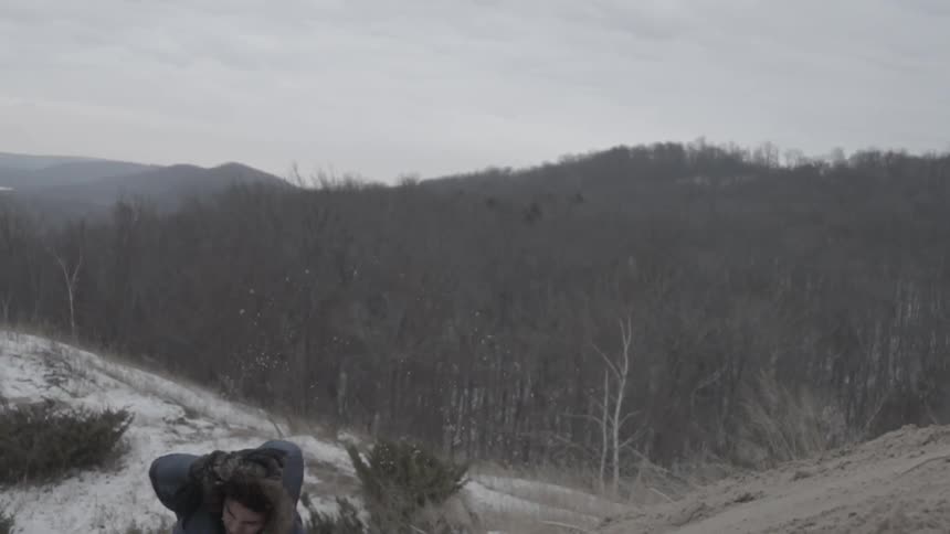 A man falls down a hill