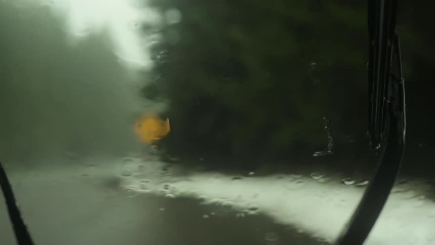 Rain splashing onto a windshield