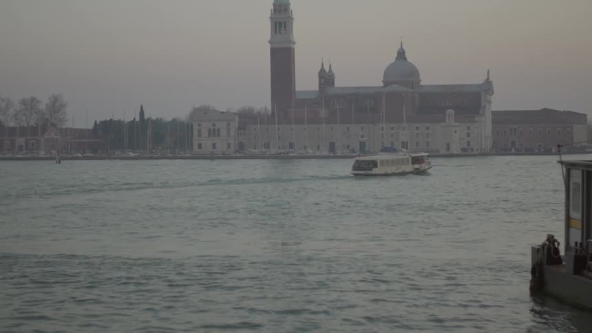 A boat floats by on the water