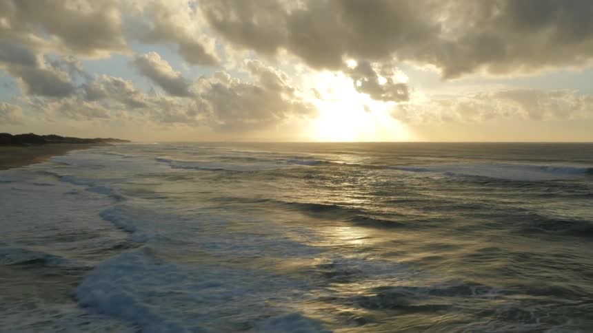 A partially cloudy beach