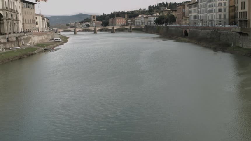 The water is calm running through the empty city