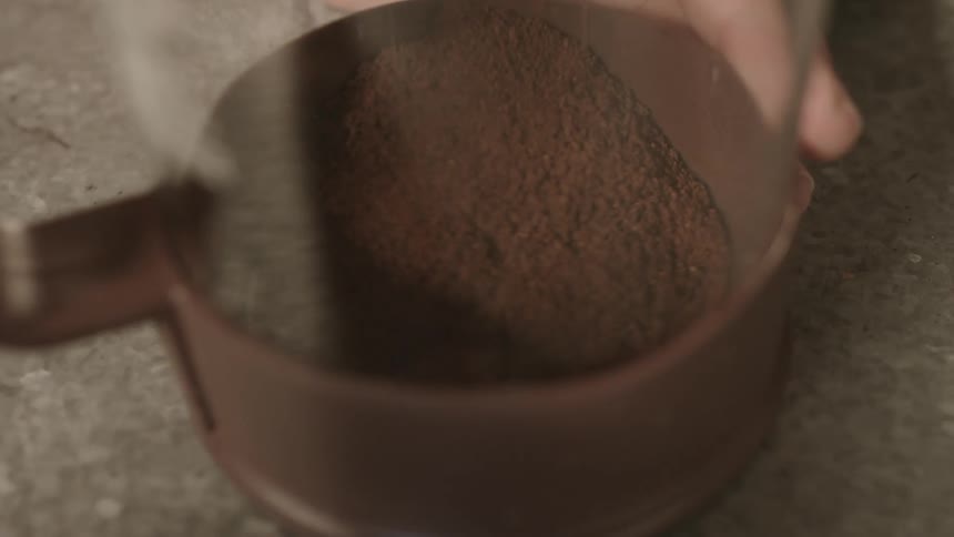 Coffee being poured into a container