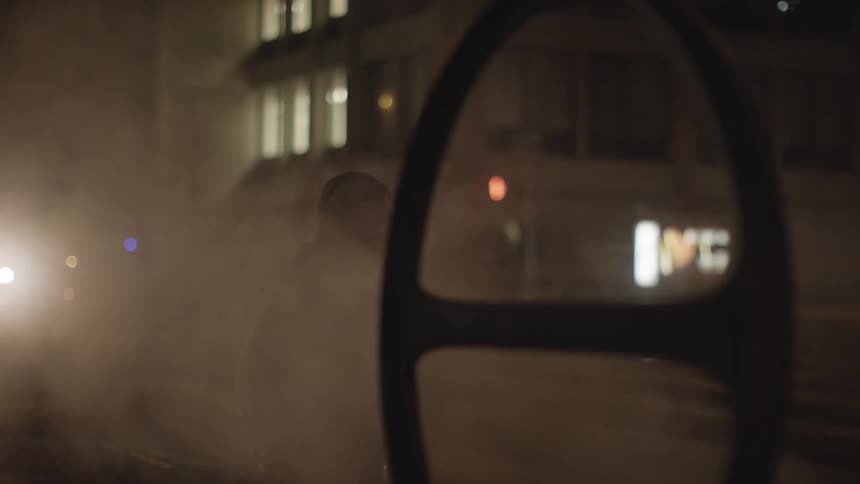 Steam rising from a city grate