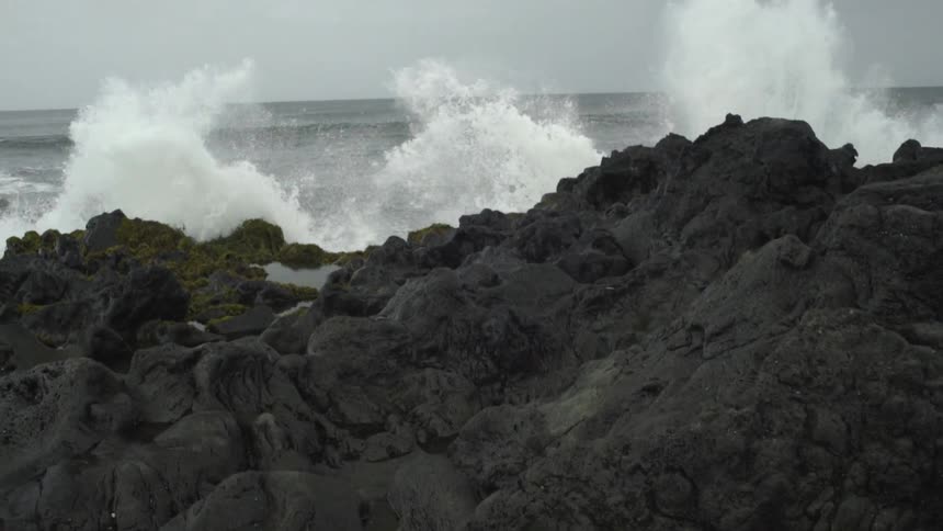 Waves crashing against rocks