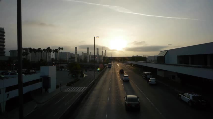 Cars drive down the freeway