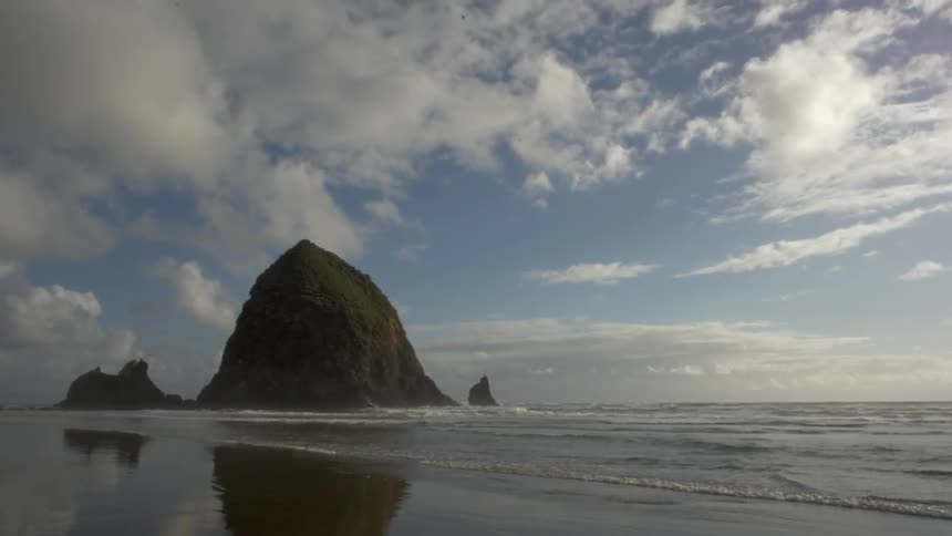 A lone cliff alongside the beach