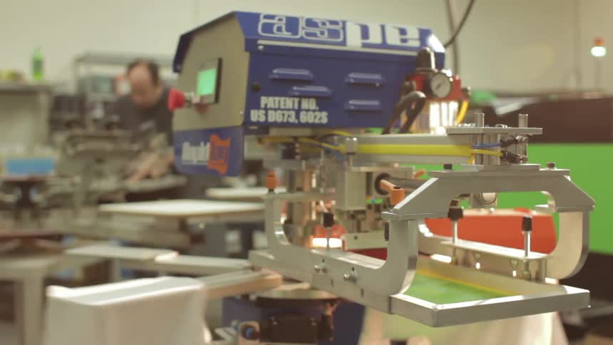 An automated machine rotates in a factory