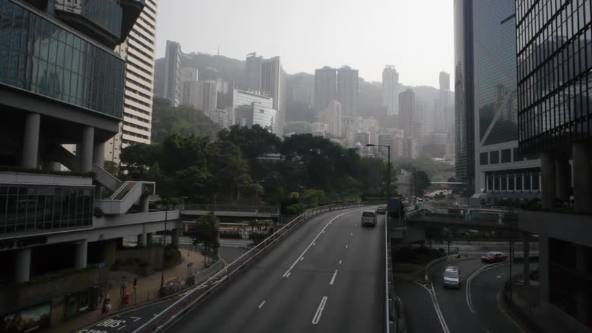 Vehicles moving on highways through a city