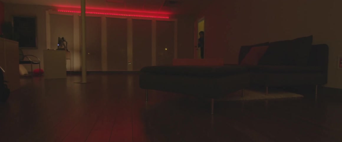 Man walking through apartment door