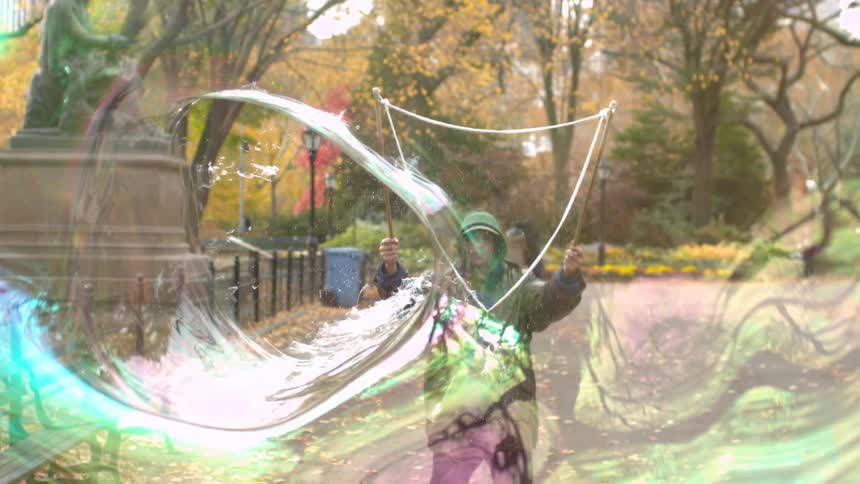 A person blowing bubbles