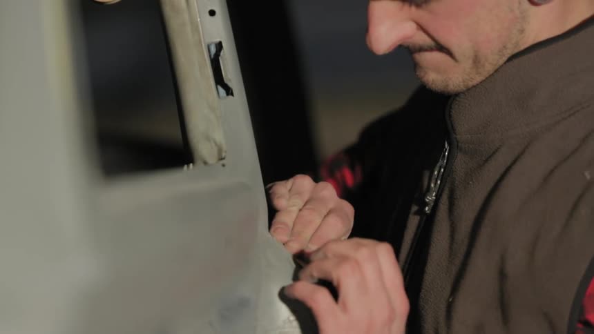 A person working on a car