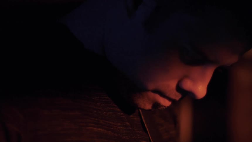 A person looking down at something