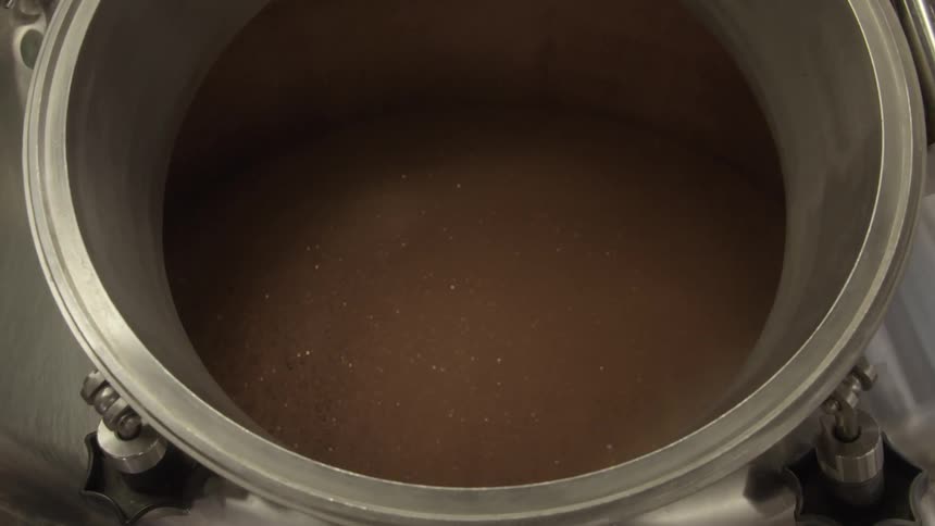 Beer is shown in a vat