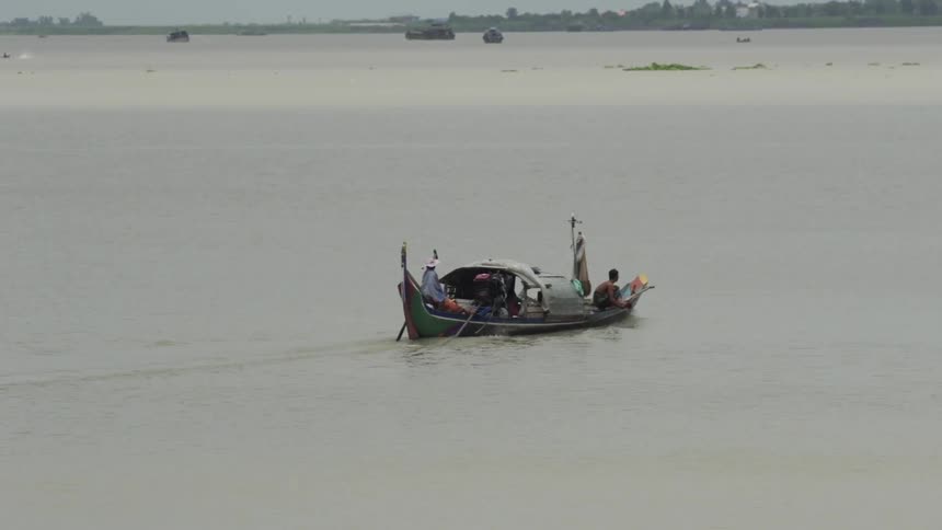 Boat gliding across a lake