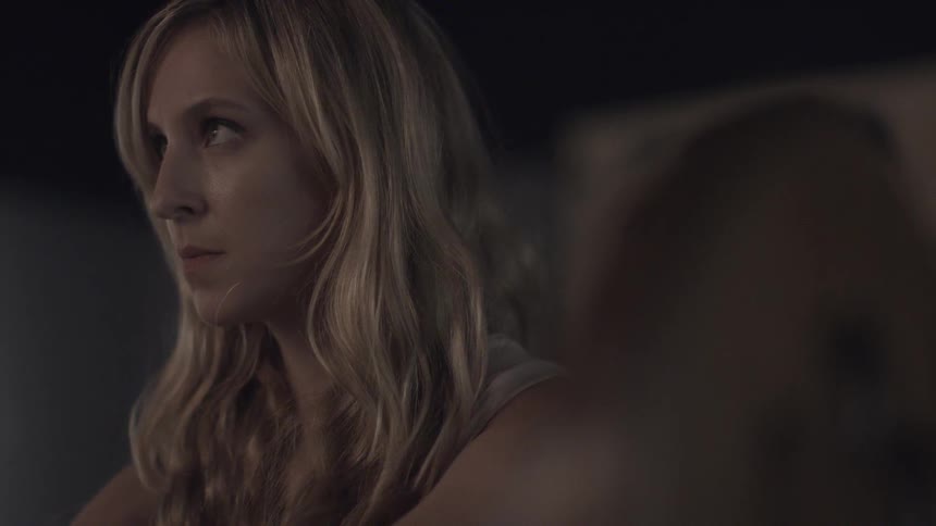 Woman looking upset rolling her eyes