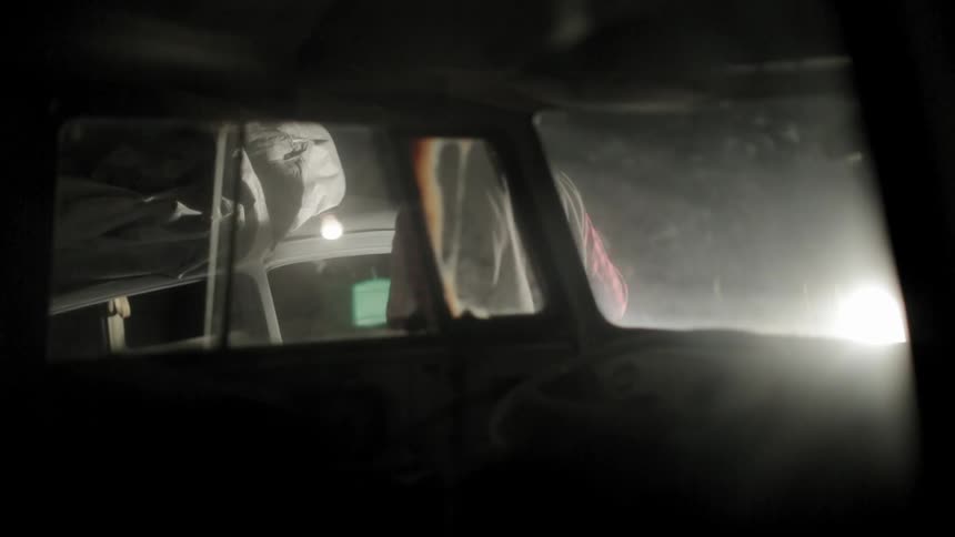 A person working on a car