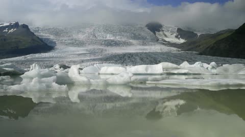 Iceberg floating along in the water