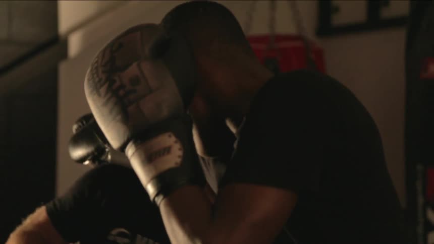 Two man doing boxing exercise