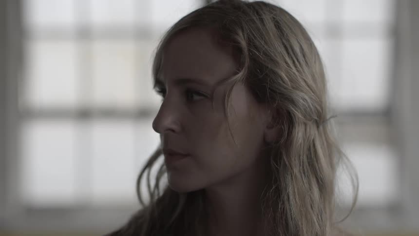 A person looking off to their side