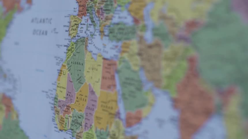 A close view of the world map which is hung on the wall