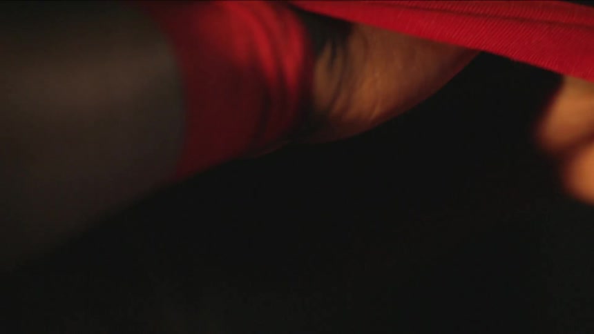 A person taping up for a fight