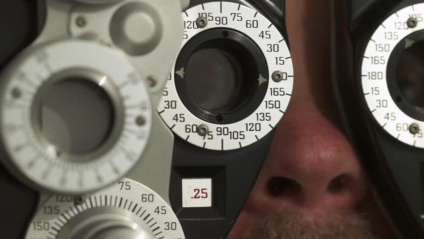 A person getting the vision tested