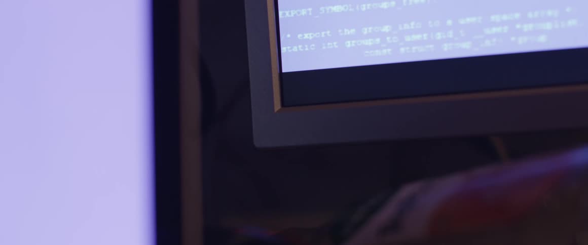 A computer screen flashes text