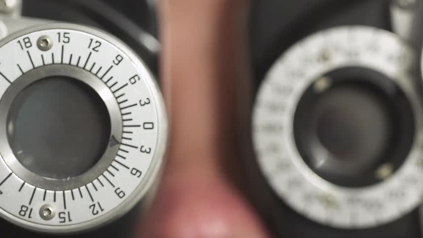 A person receives an examination at the optometrist