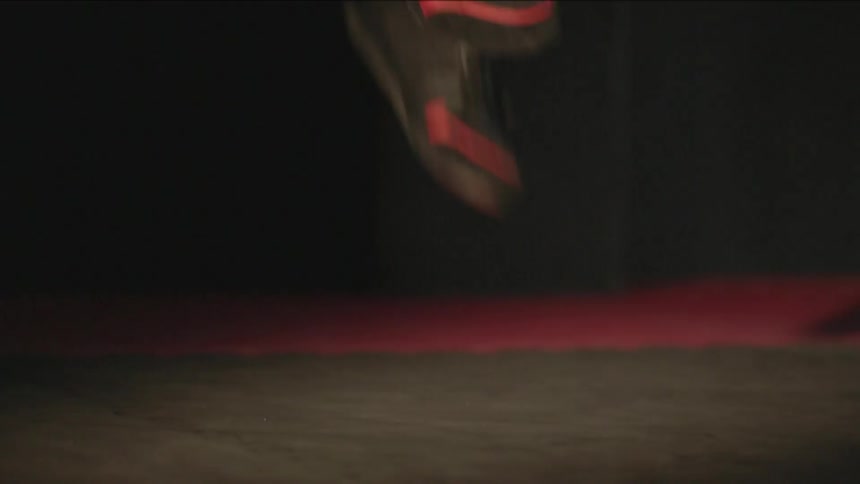A person jumping rope in a gym