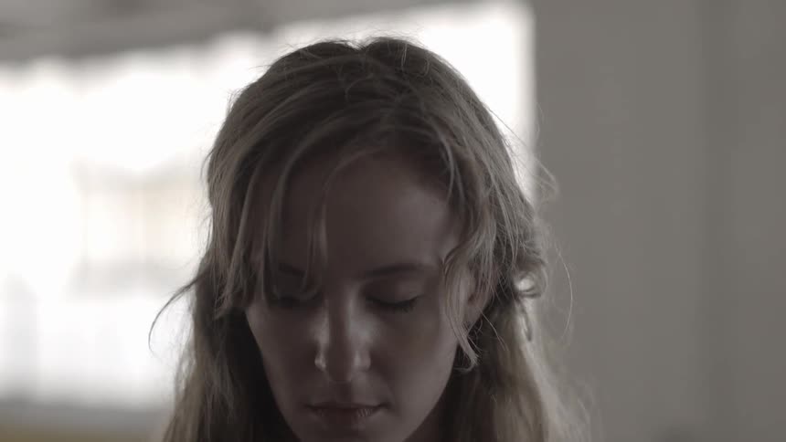 A person with their eyes closed