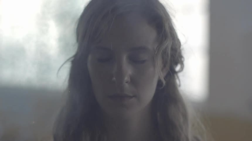A person surrounded by smoke