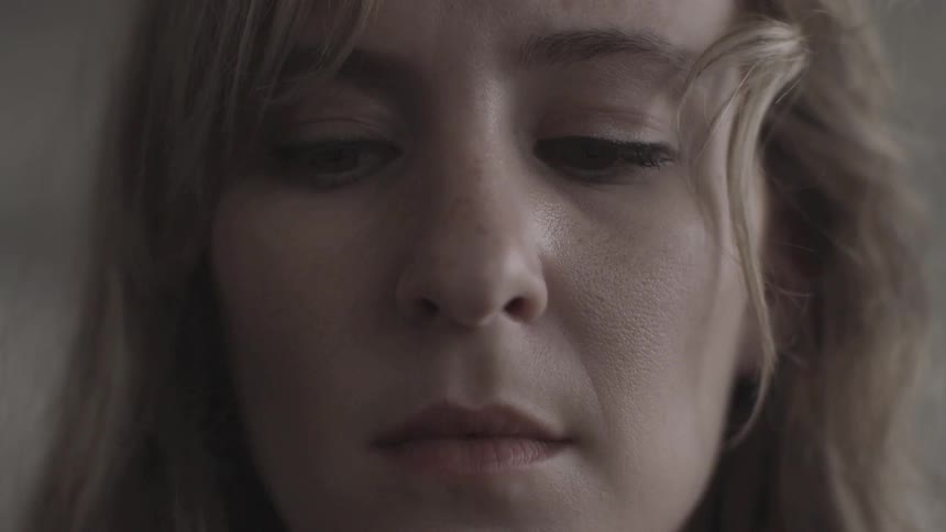 A sad looking woman