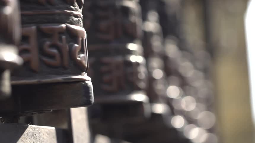 Stone cylinders rotate in unison
