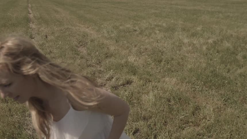 A person running in the grass