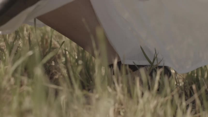 A person running in the grass