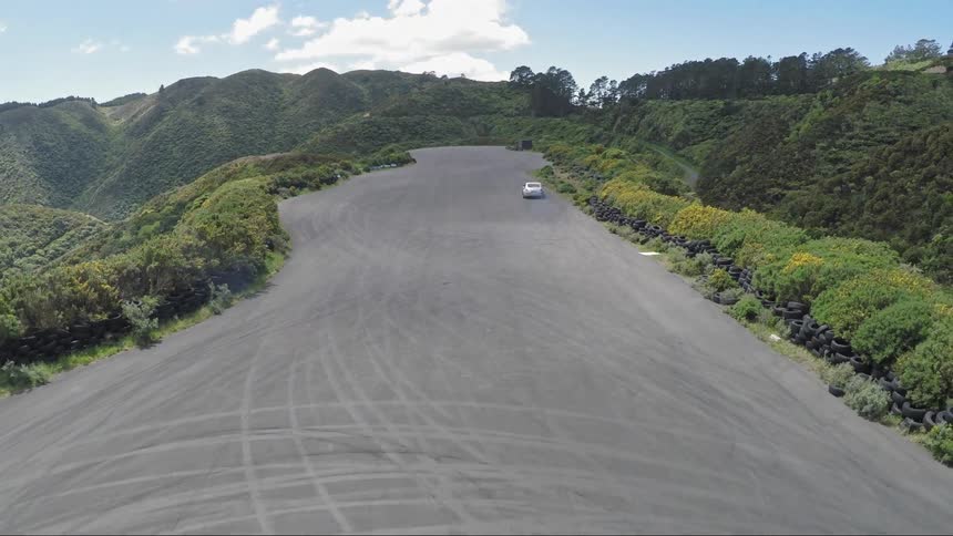 Aerial of a person driving a car