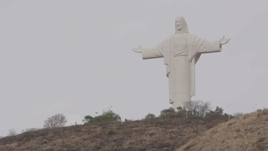 A statue on top of a hill