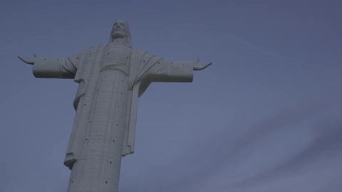A larger religious statue