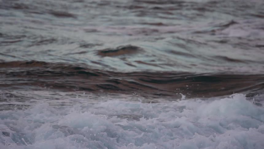 Waves crashing against rocks