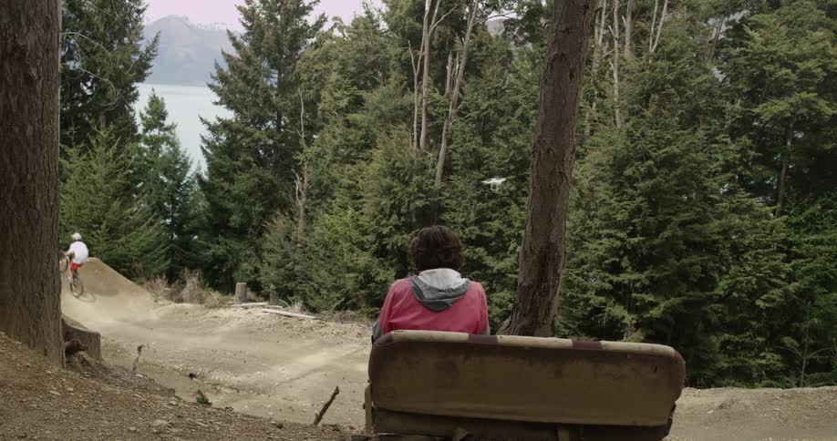 People riding bikes down a trail