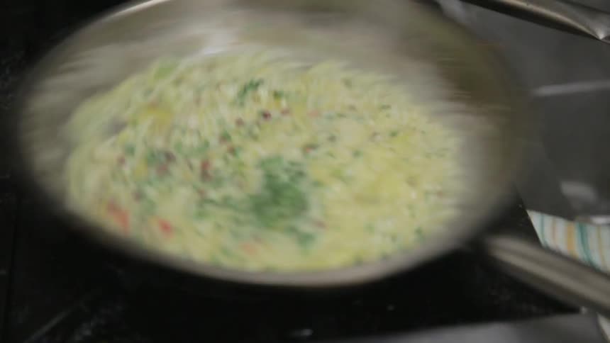 Food cooks on a stovetop