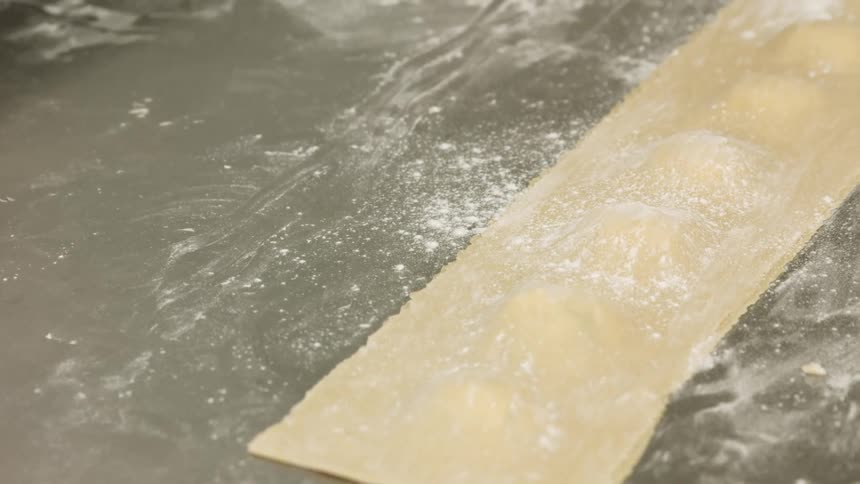 A person making pasta