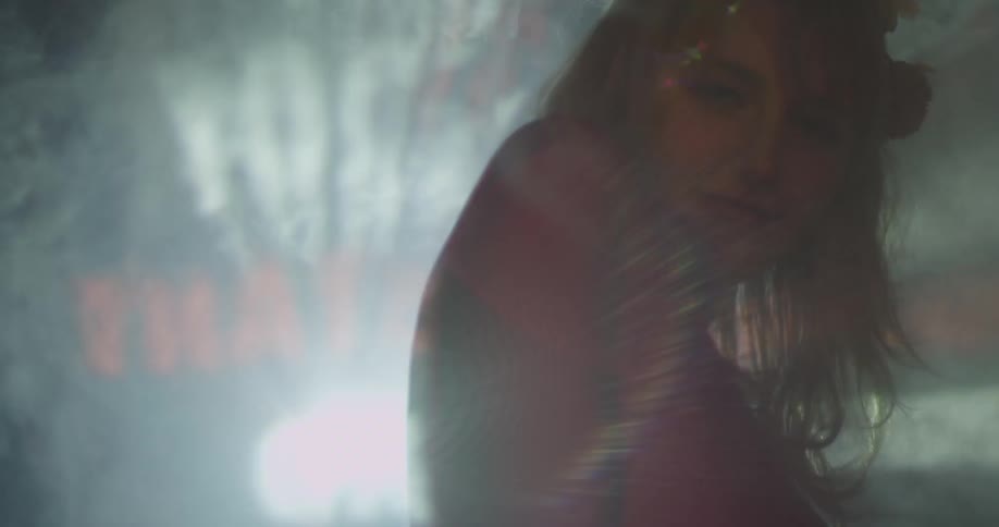 A smoky room with a person in it
