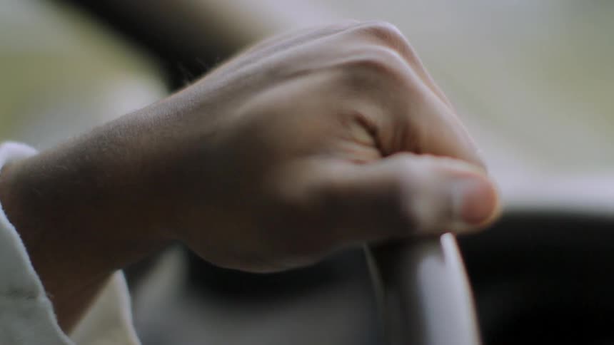 A person driving a car