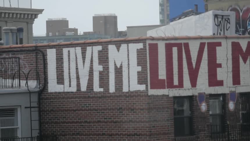 A graffiti tagged wall