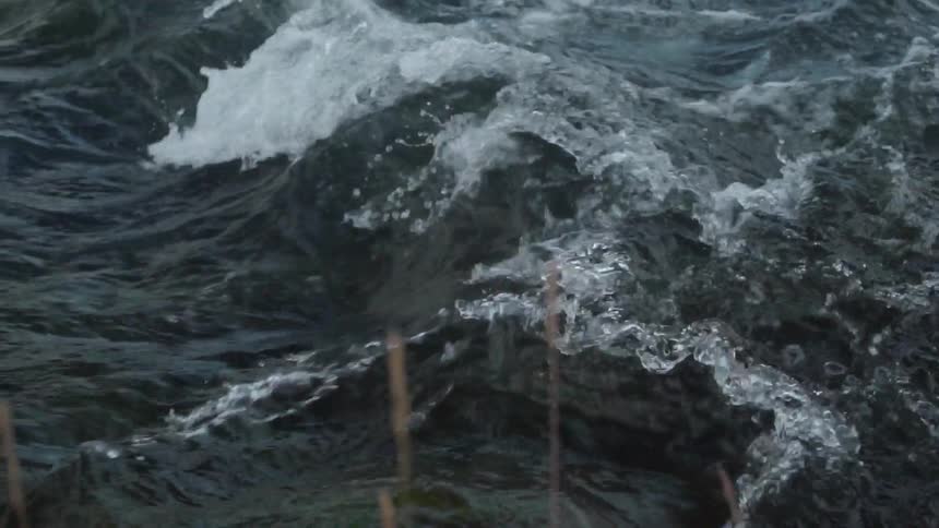 Rapidly flowing water making a crest