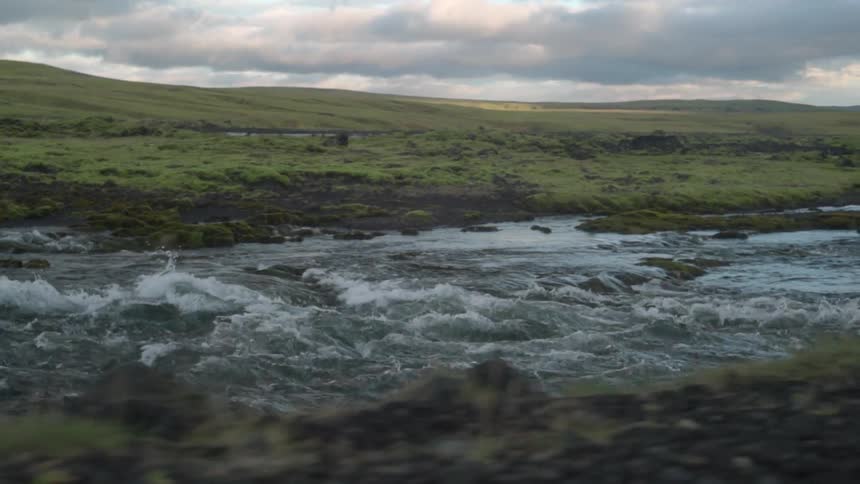 Water rushes down a river
