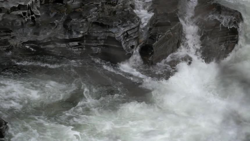 Choppy waters filled with jagged rocks